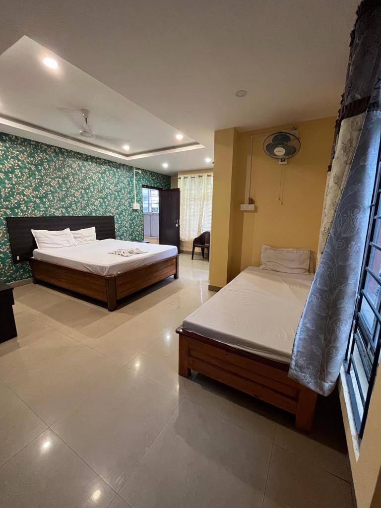 古瓦哈提 Hk Residency酒店 外观 照片
